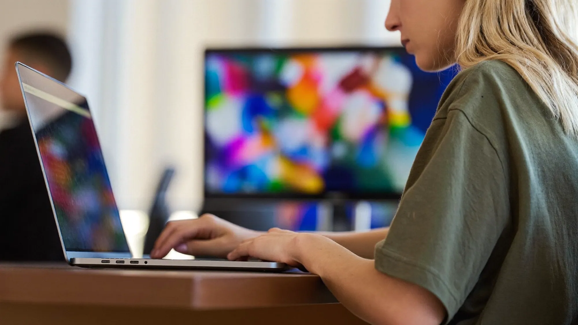 A content strategist working on a laptop, exploring whether SEO still matters in the age of AI search